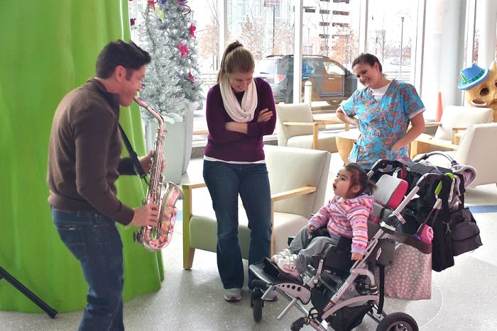 Dave Koz serenading little girl